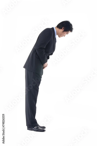 Fototapeta 고개 숙여 인사하는 비즈니스맨