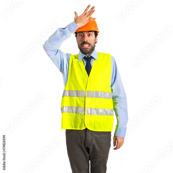 Obraz worker having doubts over white background