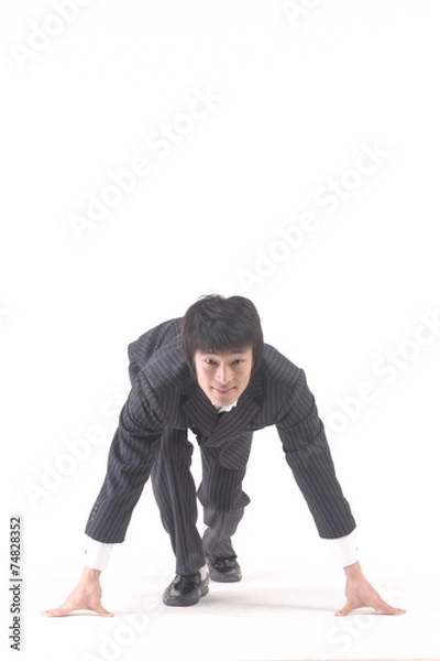 Fototapeta 스튜디오 안에서 제스처 취하고 있는 비즈니스맨