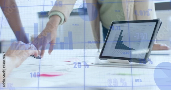 Fototapeta Image of financial data processing over diverse businesspeople working in office