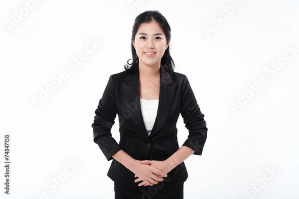 Obraz 서서 제스처를 취하는 아시안 비즈니스 우먼