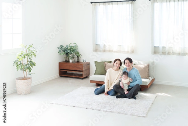 Fototapeta カメラ目線の笑顔の家族