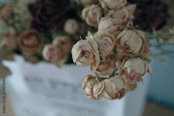 Fototapeta dried rose on a table