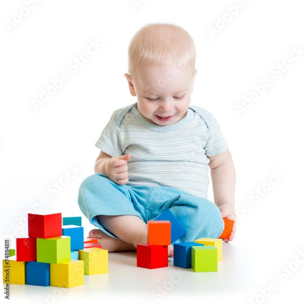 Fototapeta toddler kid boy playing  wooden toys