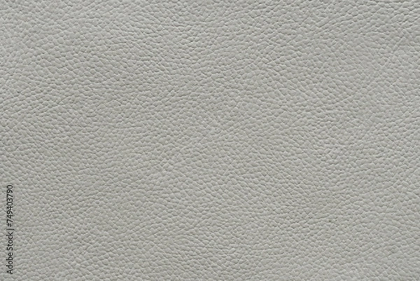 Fototapeta High-resolution image of white leather with a detailed pebbled texture, ideal for backgrounds in luxury design.