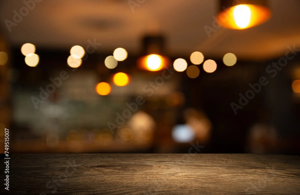 Obraz empty table to showcase your product, against the background of a blurred cafe golden bokeh. High quality photo