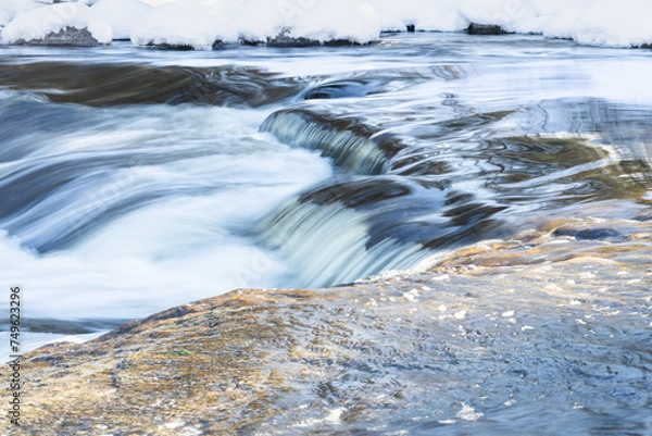 Obraz Water flowing past the trail at Pine Point Rapids in Manitoba 