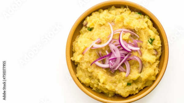 Fototapeta Dominican Mangu, mashed plantains with red onions, vibrant green and purple, top-down view isolated on white background. Caribbean cuisine concept. Design for tropical food guide, culinary blog