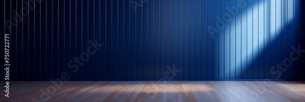 Fototapeta empty room with blue wall , wooden floor and spotlight,dark blue corrugated wall background with shadow sunlight. A bright blue room with a warm wooden floor and modern vertical blinds.. banner design