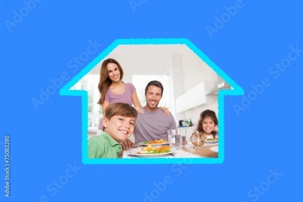 Obraz Composite image of family looking at the camera at dinner time