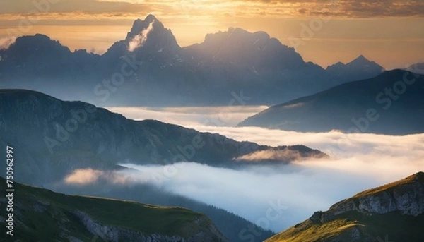 Fototapeta An image of epic mountains enveloped in morning fog, with sunlight casting a warm glow, creating a serene and majestic natural background.