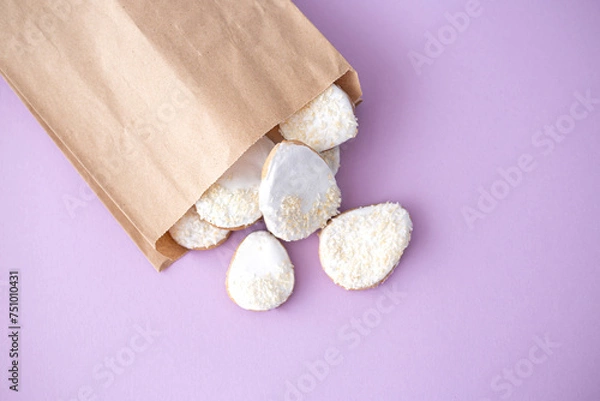 Obraz Easter gingerbread eggs in a paper bag