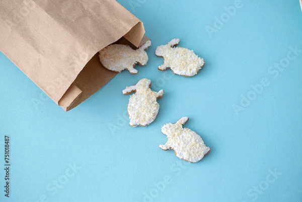 Obraz Easter gingerbread bunnies in a paper bag