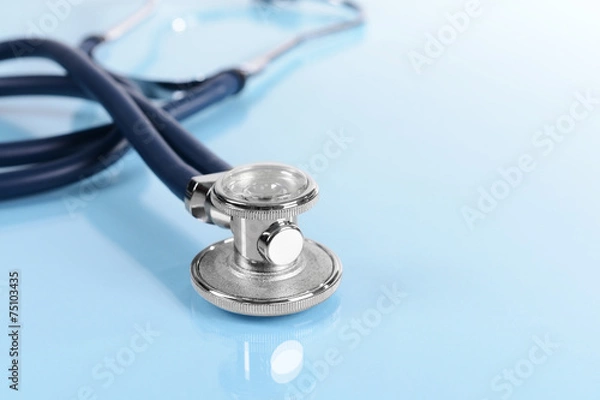Obraz Stethoscope on light blue background