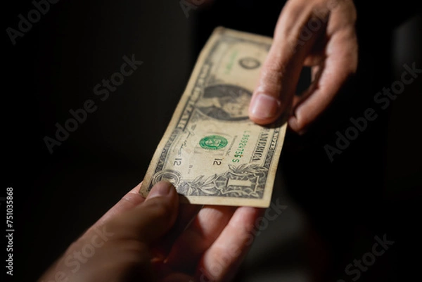 Fototapeta The picture represents cases of corruption and bribery in many different cases such as politics, football, business in Brazil, Europe and the USA. This could be in dollar, euro or brazilian real.