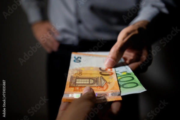 Fototapeta The picture represents cases of corruption and bribery in many different cases such as politics, football, business in Brazil, Europe and the USA. This could be in dollar, euro or brazilian real.