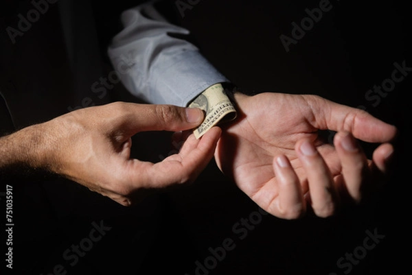 Fototapeta The picture represents cases of corruption and bribery in many different cases such as politics, football, business in Brazil, Europe and the USA. This could be in dollar, euro or brazilian real.