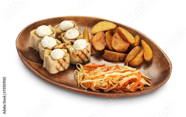 Fototapeta cabbage salad, country potatoes and rolls on a wooden plate isolate on white background