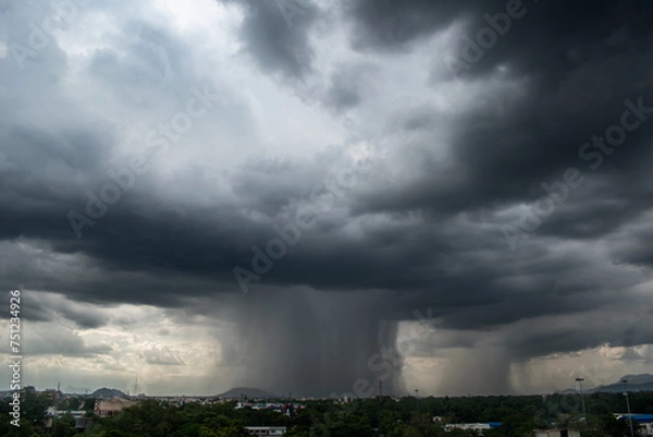 Fototapeta A stormy sky with a large rain cloud
