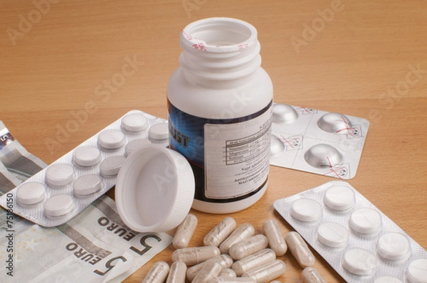 Fototapeta medicine on table with EURO money
