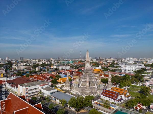 Fototapeta Pagoda at Wat Arun buddhist Temple of dawn a tourist landmark with Chao Phra Ya river aerial view