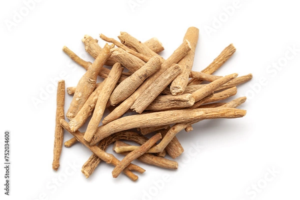 Obraz A pile of Dry Organic Ashwagandha (Withania somnifera) roots, isolated on a white background. Top view