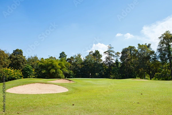 Obraz Golf course with blue sky background