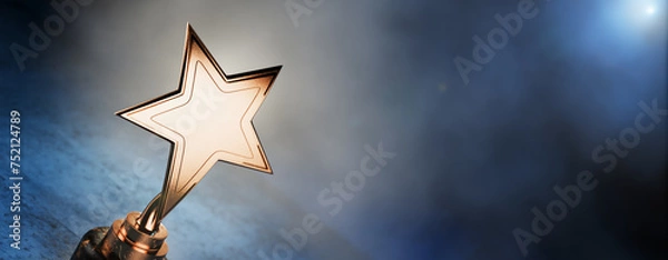 Fototapeta Gold star on a blue background as a reward. First place in a computer game. Top Performance Award. Winners Cup. Goal achievement concept. Winner certificate. Achievements. Victory. 3D rendering.