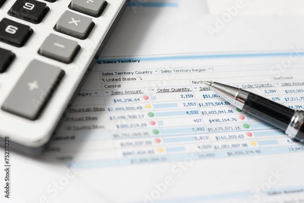 Fototapeta Pen and report paper, business conceptual
