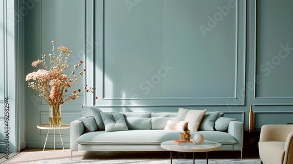 Fototapeta This modern living room in blue tones features a blend of classic and contemporary elements, with a spacious sectional sofa and sleek coffee table. Light walls and soft beige carpet.