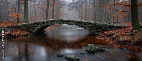 Fototapeta An ancient stone bridge in the autumn forest. Generated AI 