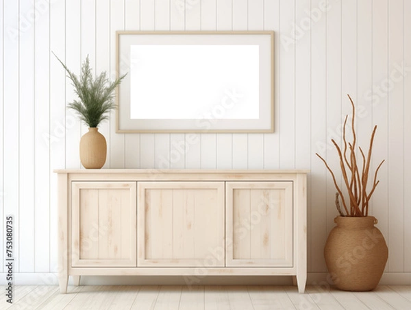 Fototapeta Mockup of a picture on the wall in a beach style living room with a wooden sideboard and green plants. Frame for posters