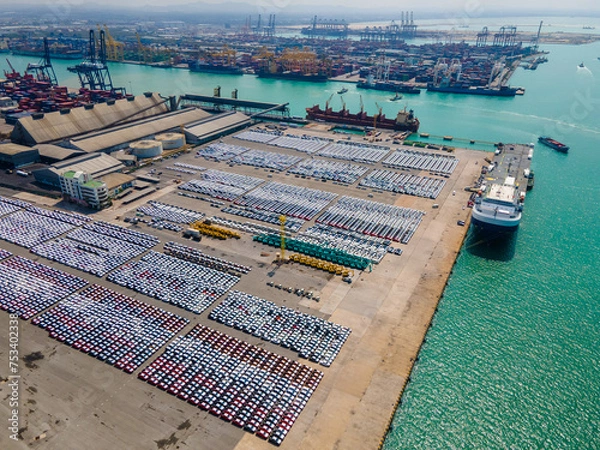 Fototapeta the image showcases the organized logistics and global commerce involved in the automotive export industry. the concept of transportation and industrial