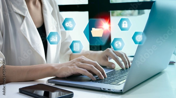 Fototapeta Businesswoman working on laptop with virtual screen. Online documentation database and document management system concept.