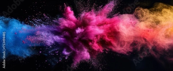 Fototapeta Vibrant Explosion of Colored Powder Capturing the Dynamic Intersection of Vivid Pigments in Midair Against a Stark Black Background