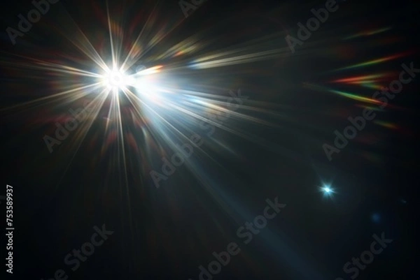 Fototapeta Abstract blurred colorful lens flare bokeh on black