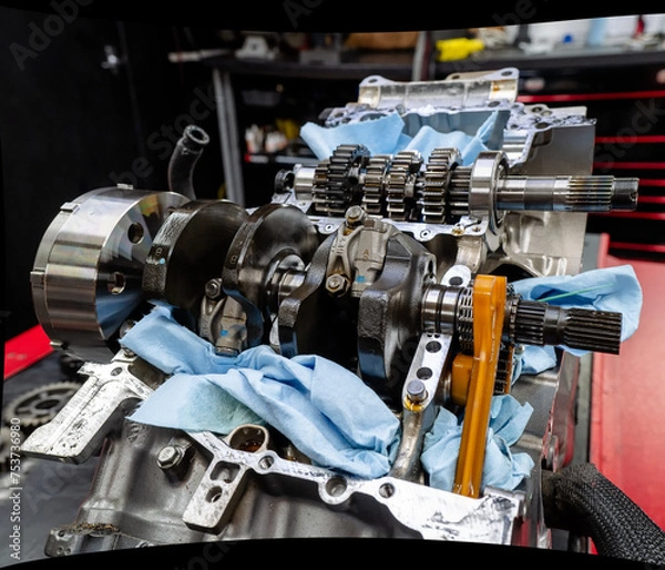 Fototapeta Motorcycle engine being rebuilt 