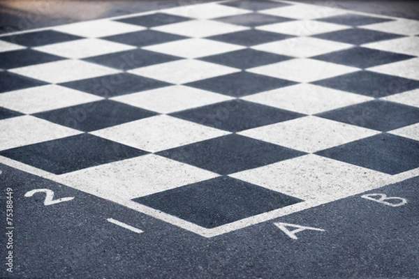 Obraz chess board on asphalt