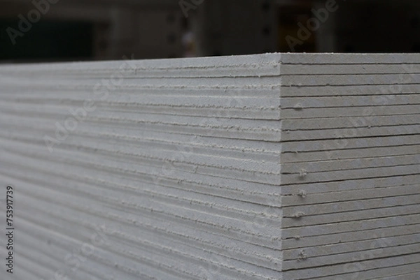 Obraz Stack of gray gypsum fiber boards, selective focus.