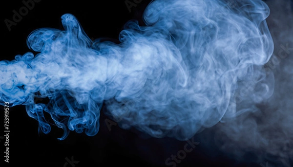 Fototapeta Abstract blue smoke steam moves on a black background. image of an isolated light