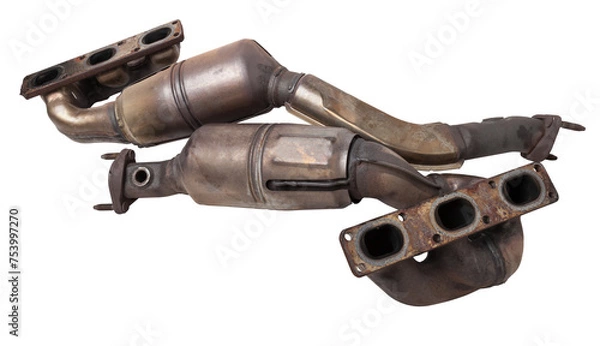 Fototapeta Automotive catalyst removed from a vehicle for repair with a ceramic coating inside as part of an exhaust system to remove harmful emissions in a car repair shop