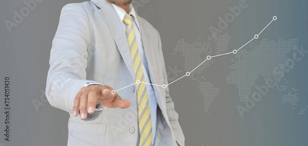 Fototapeta businessman hand holding success on a touch screen interface