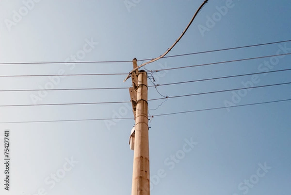 Obraz electric pole carrying power lines