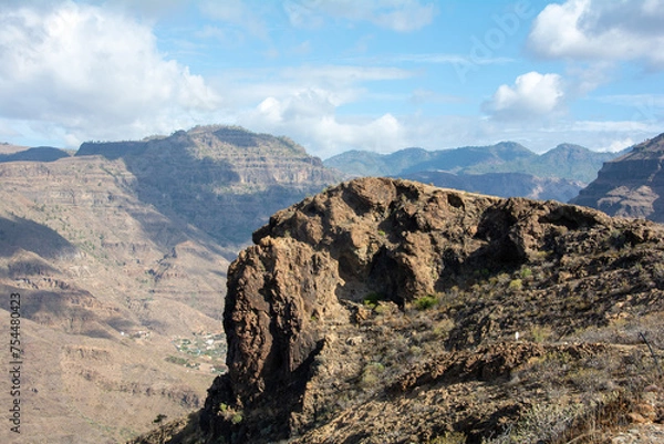 Fototapeta Mountains and blue sky with clouds