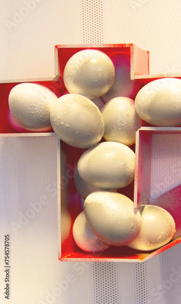 Fototapeta Eggs with golden light to celebrate Happy Easter