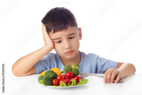 Obraz Boy eating vegetables