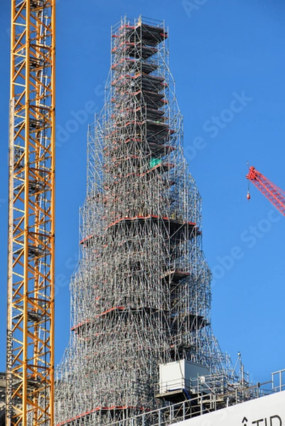 Obraz Paris, France. Notre Dame Cathedral is being rebuilt with its spire restored. December 17, 2023.