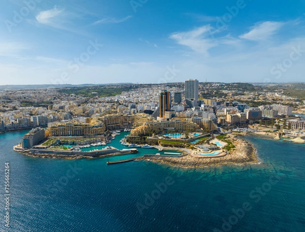 Obraz Aerial view of St. Julian's city and modern high buildings. Day. Maltese island, Mediterranean sea