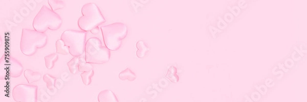 Fototapeta Banner with textile hearts confetti on a pink background. Place for text.