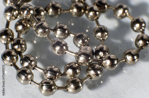 Obraz Silver chain close-up on white background